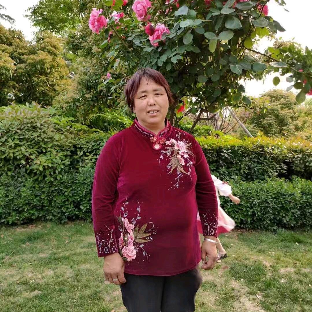 张其英
