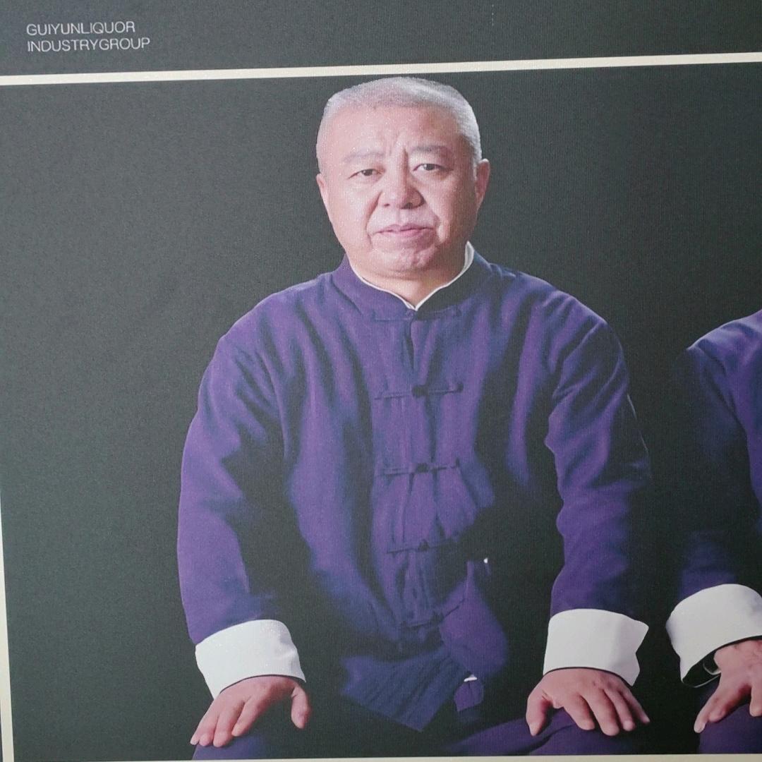 毛承