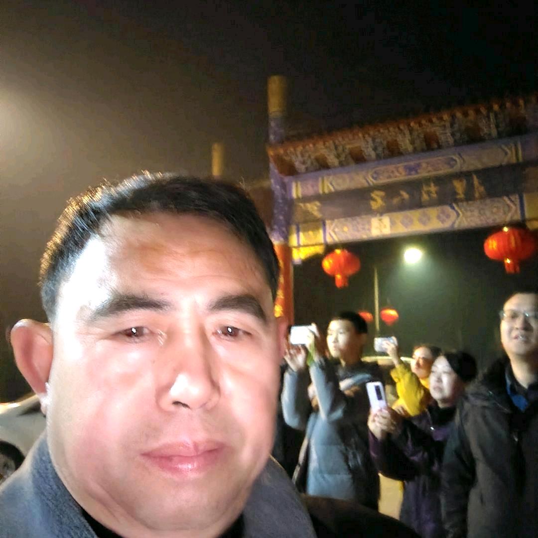 丁新建