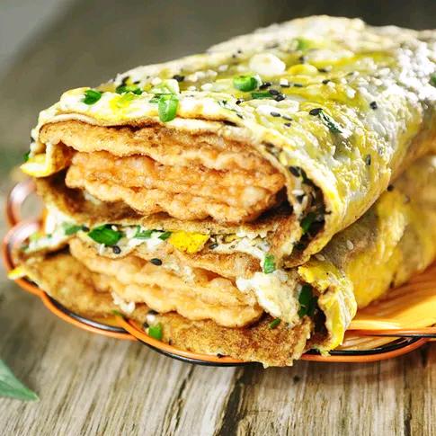 奥林公馆斜对过石老磨煎饼店