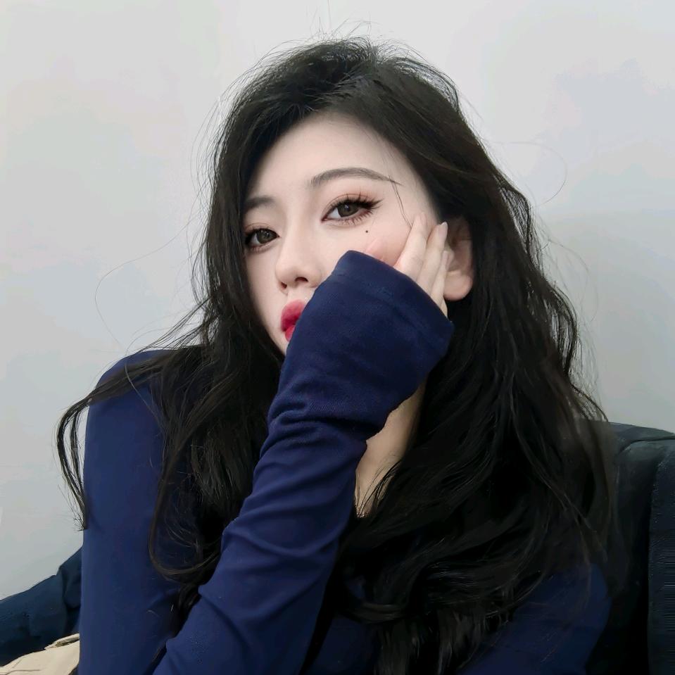 妮.