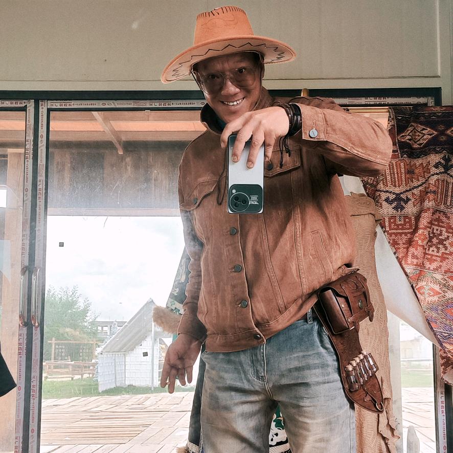 玩音乐的摄影师奇骏