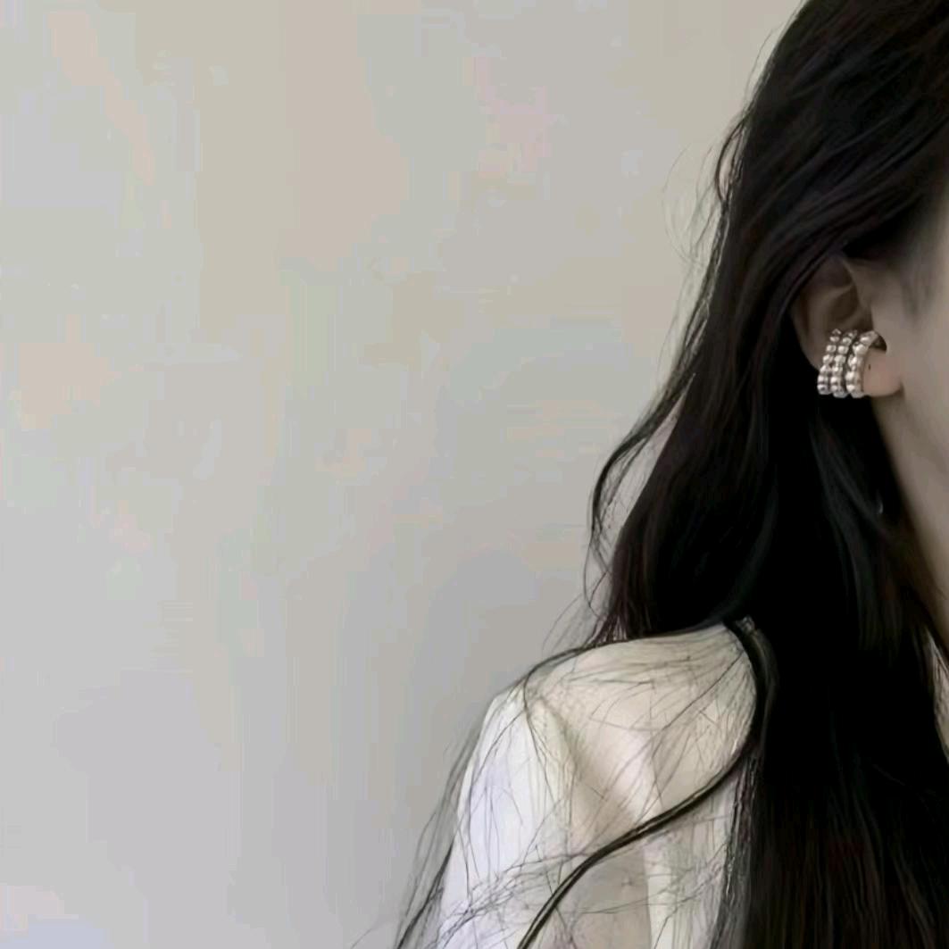 L."
