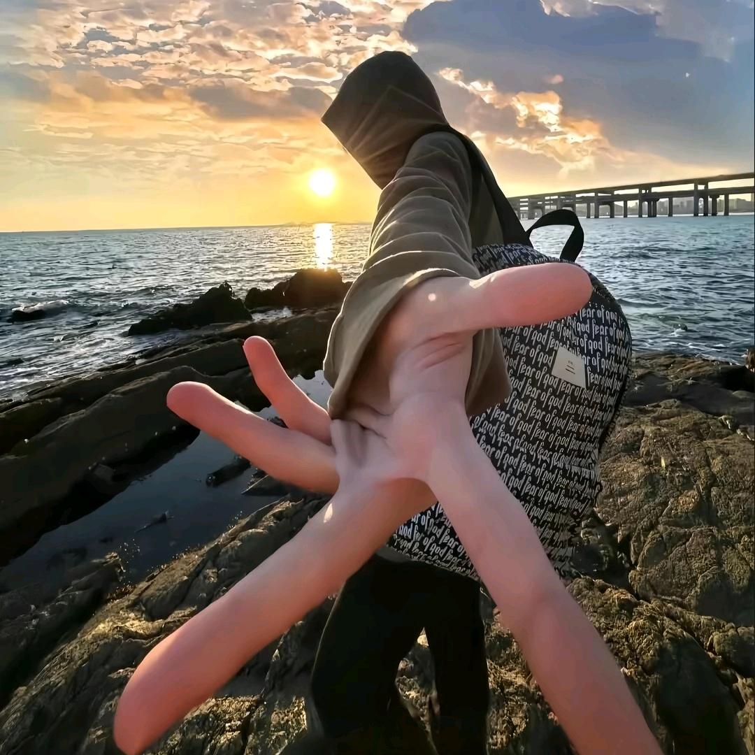 沐一.
