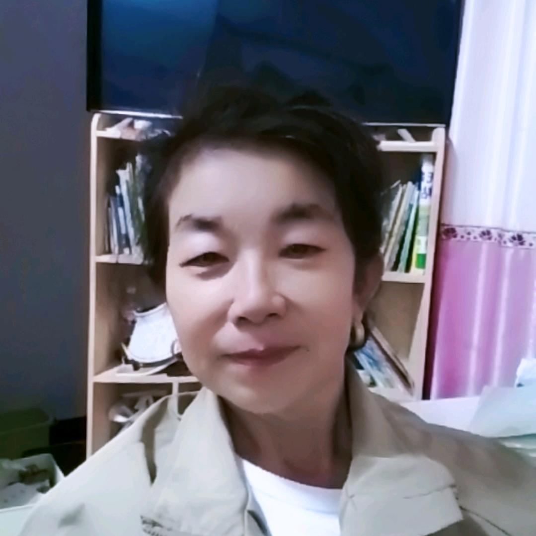 刘~