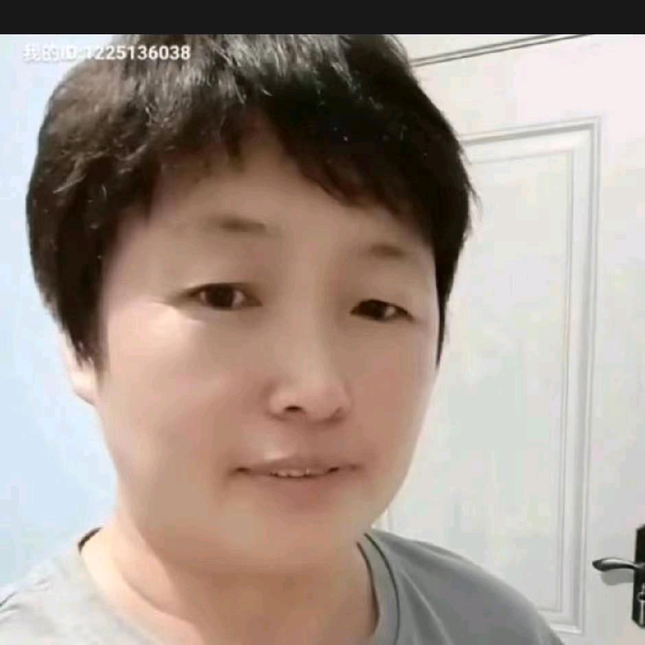 佐手微笑