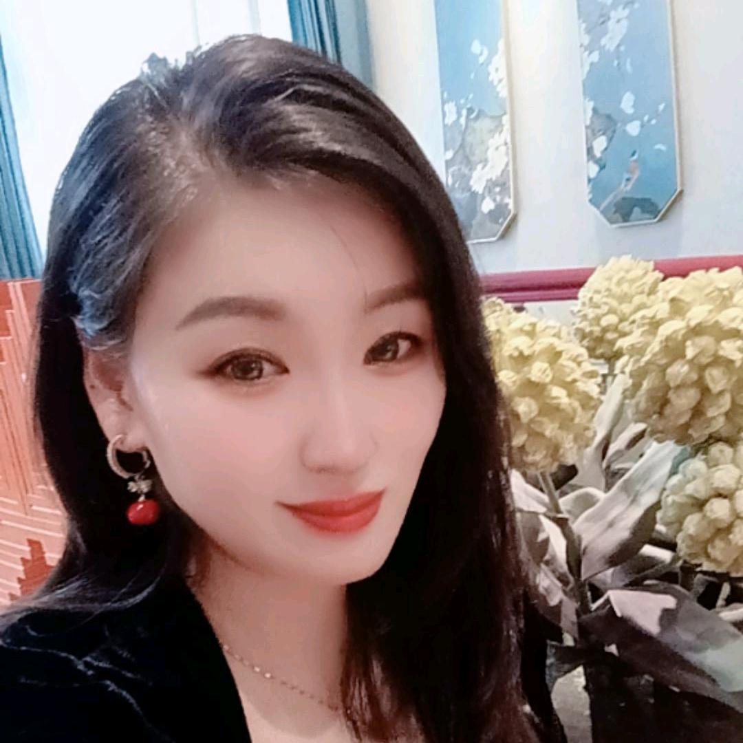 嫣然