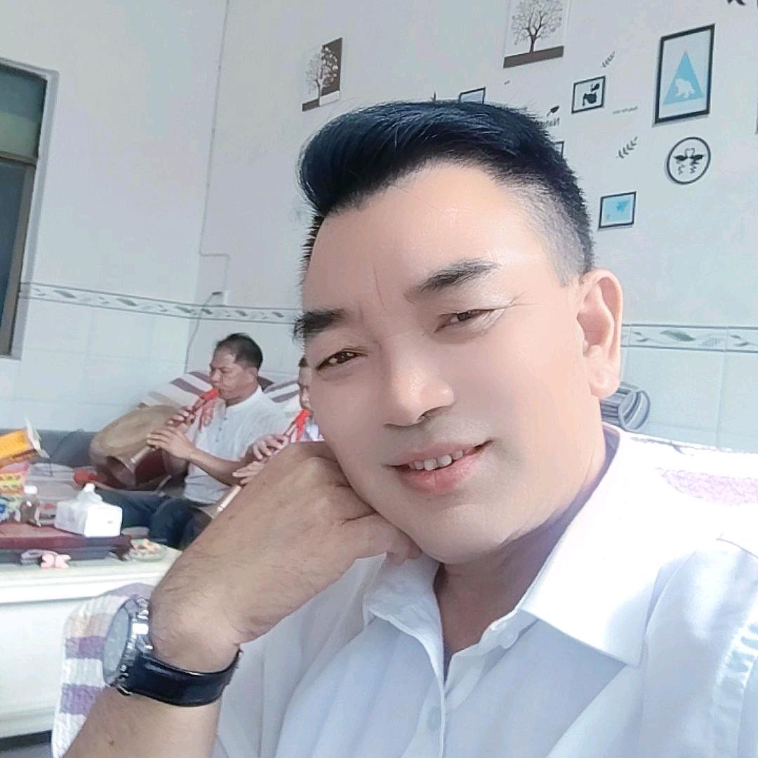 梁哥