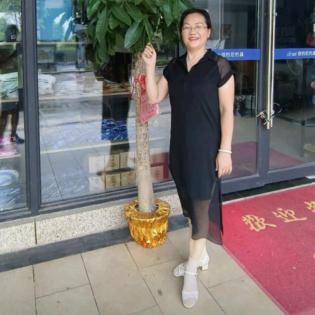 王美华