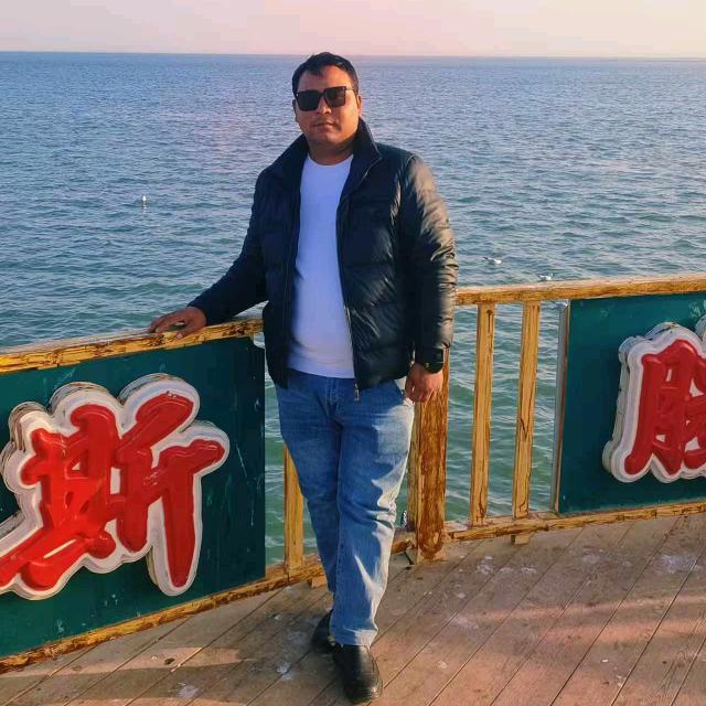 热 合 曼 江
