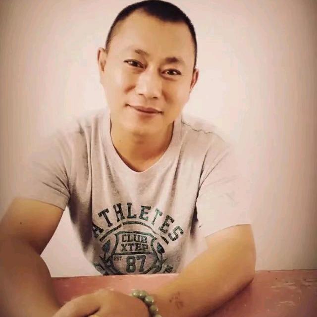 灿烂阳光，羅書國