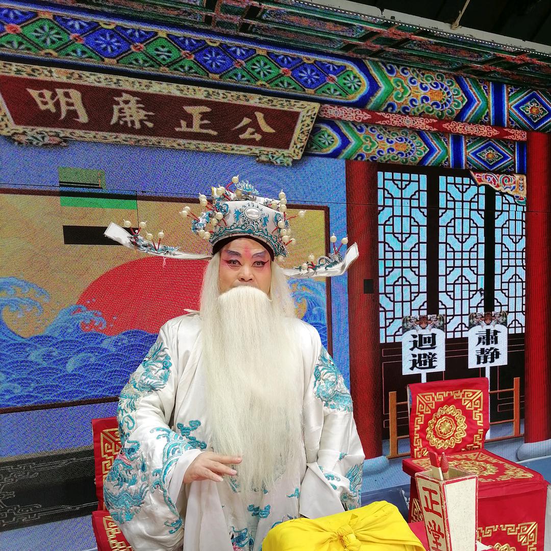 李华