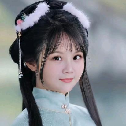 嫣然