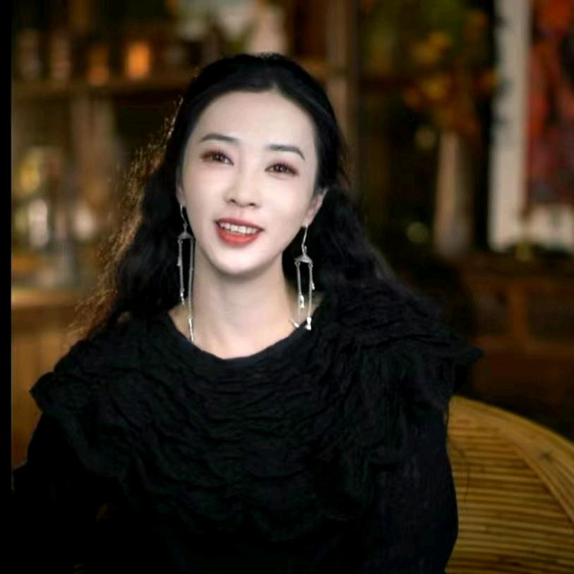 游尘飞雀色彩棉麻服饰店