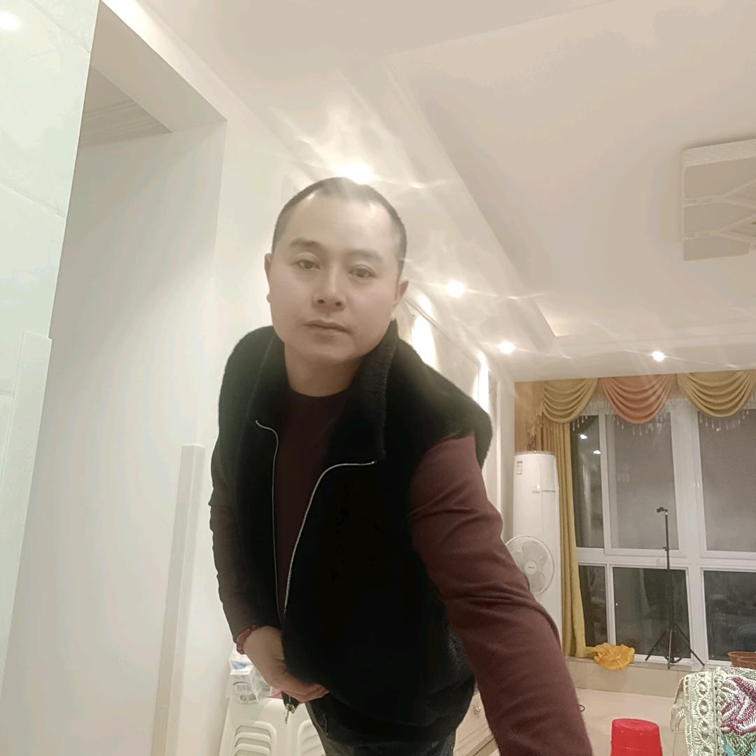 梁强