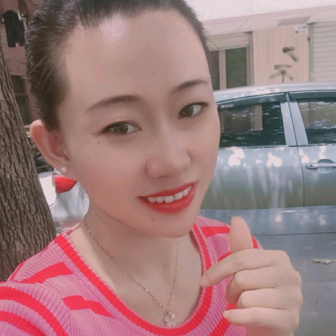 小菲  
