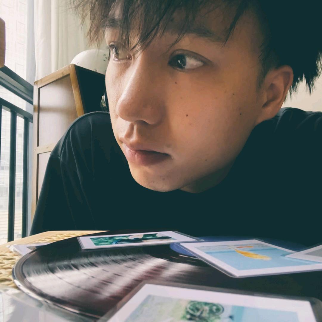 问问周