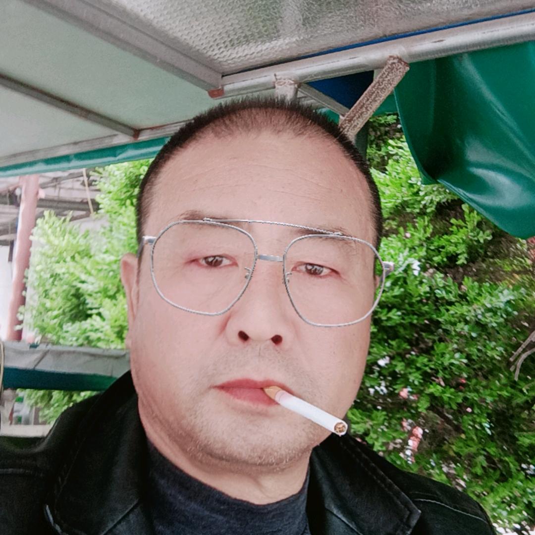 心里有座坟