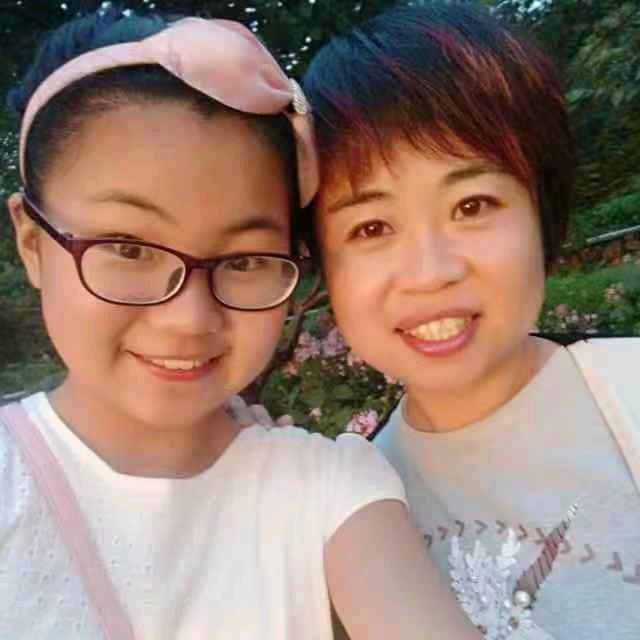 莞尔一笑