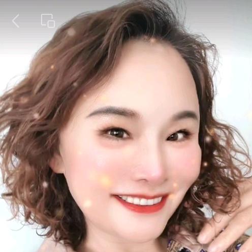 妮