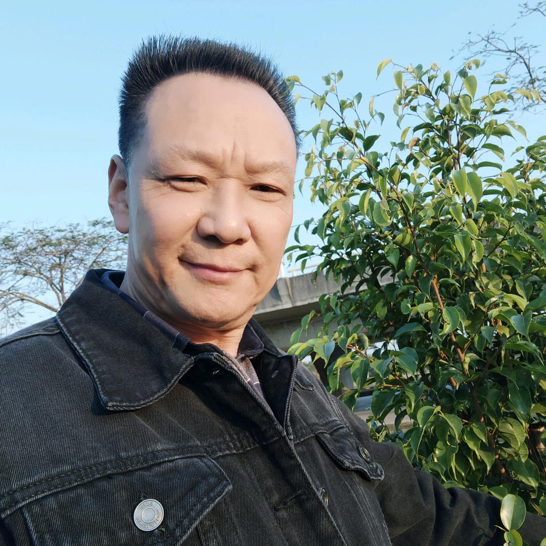 程默是金