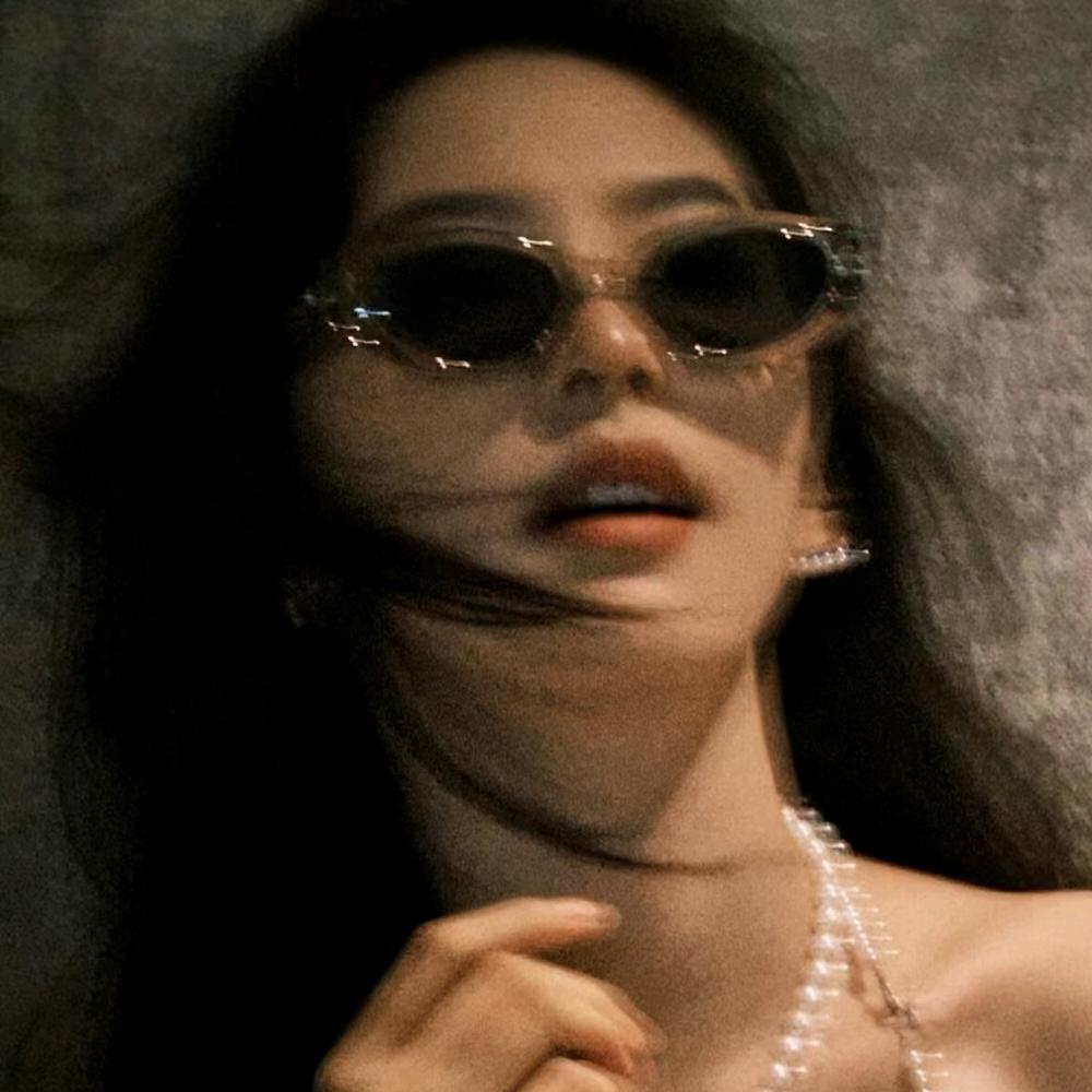 M.