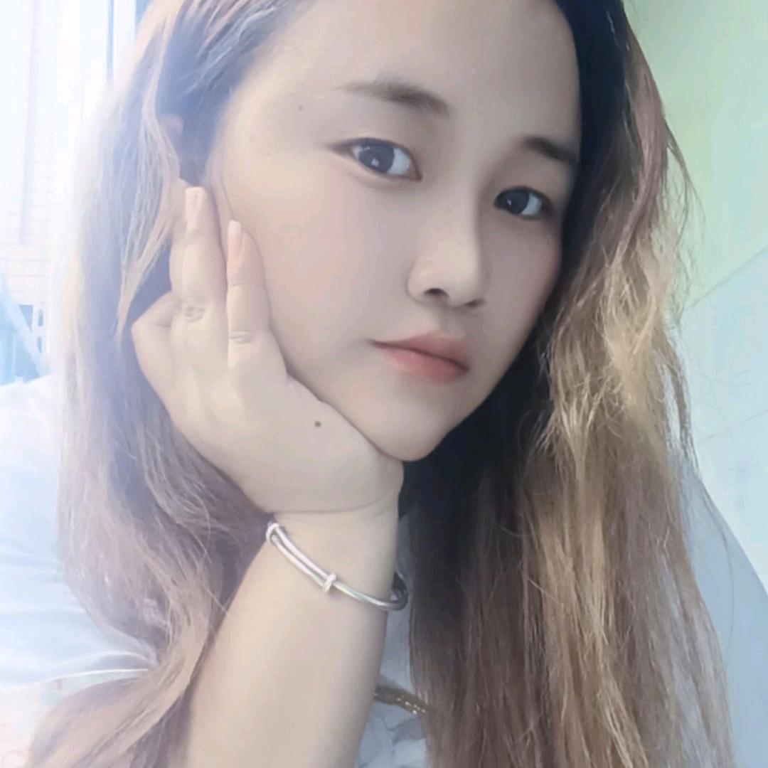伤~哲