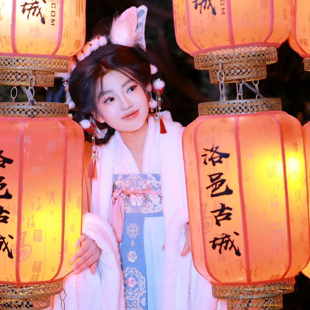 媚.