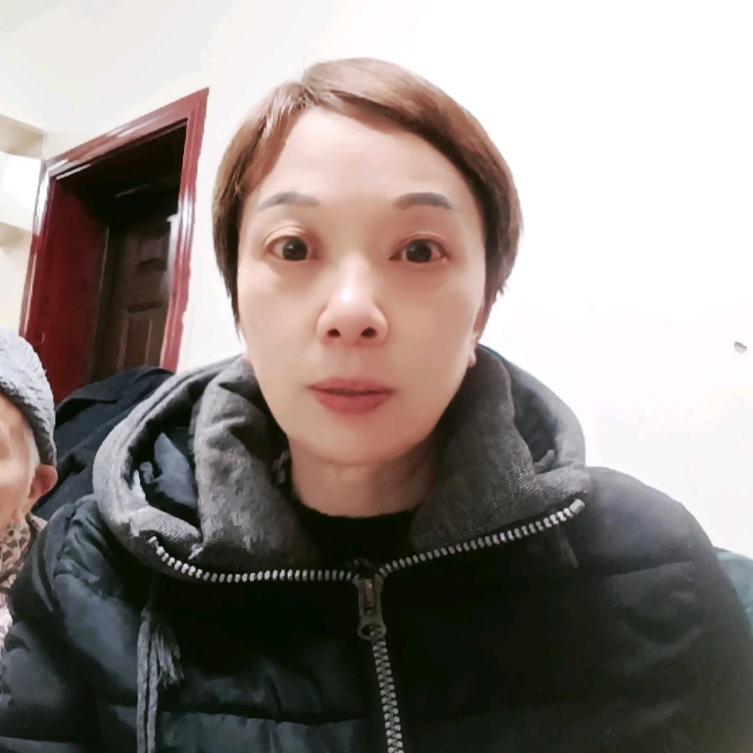 唐仁美，