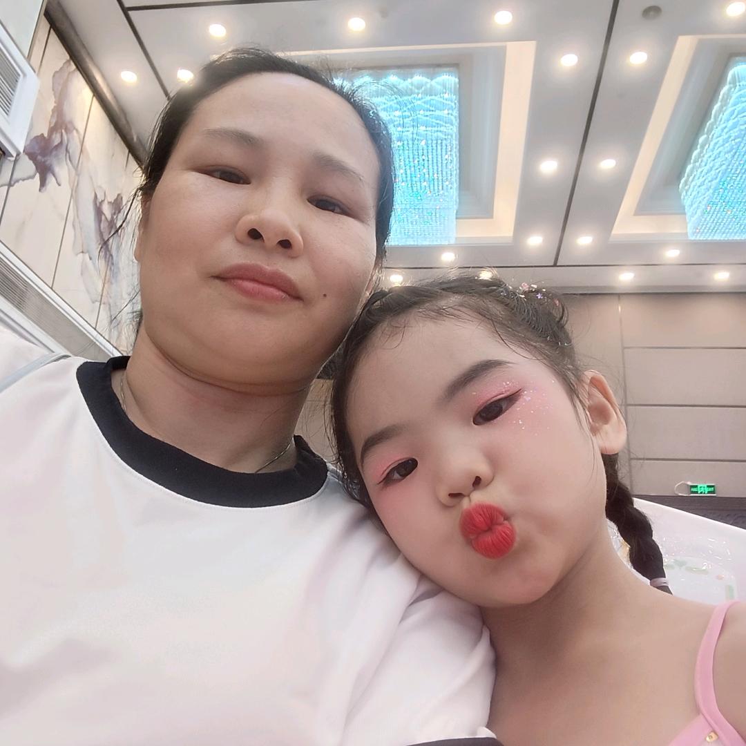 妩媚吖