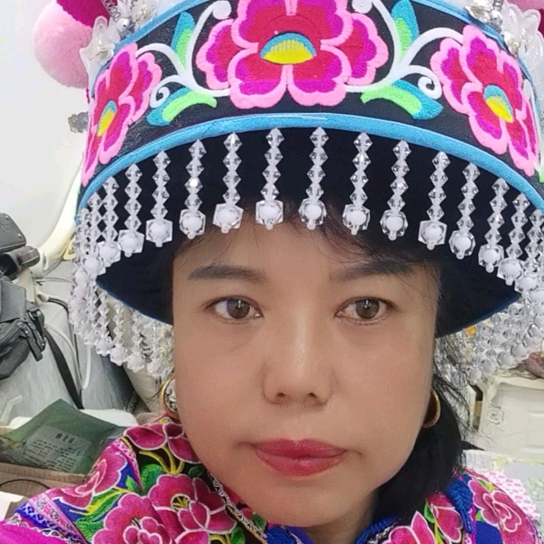 晓霞（尊师烟筒十字山歌王）