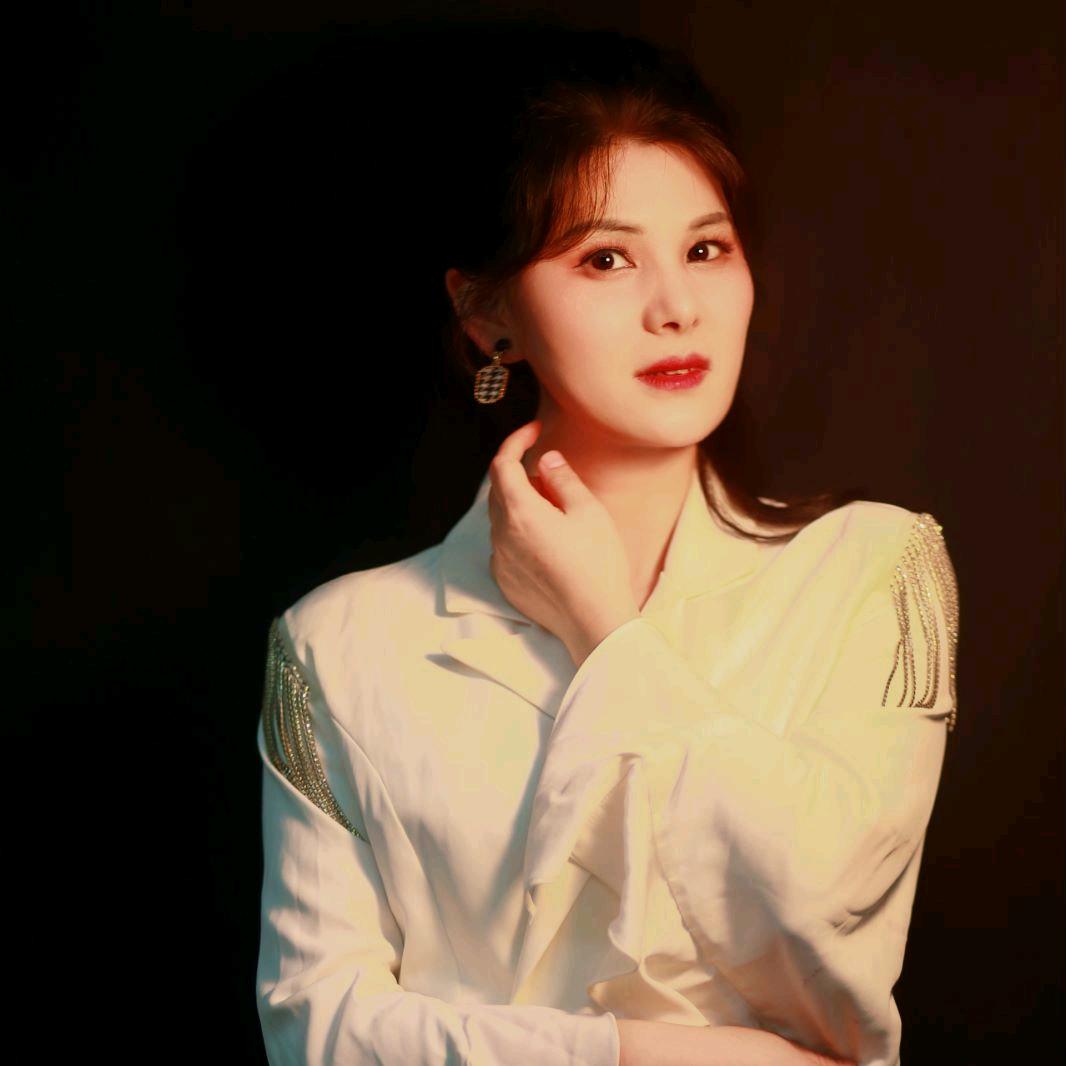 乐镱美
