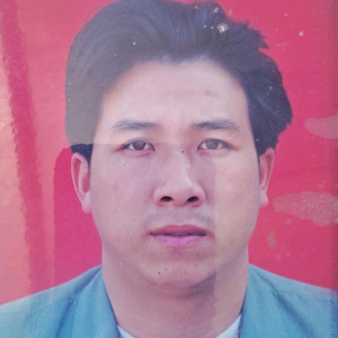 覃树才