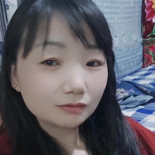 妮.