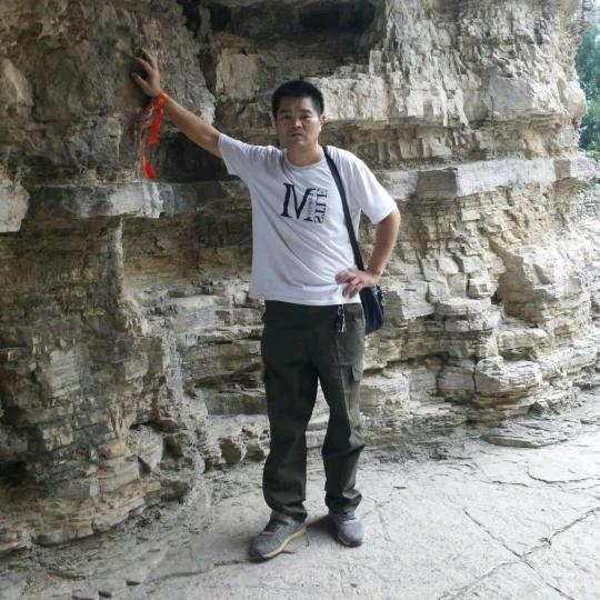 秦国成
