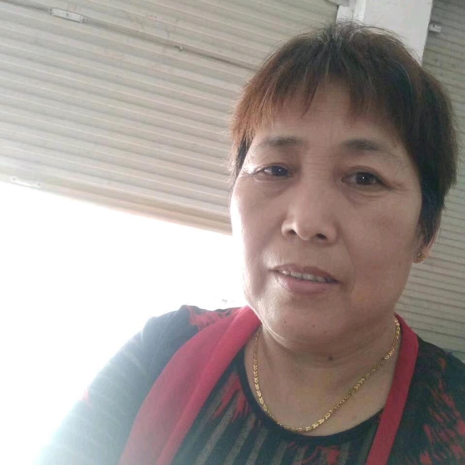 段美华