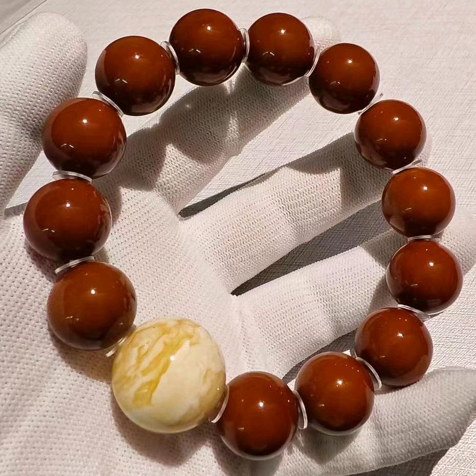 陈氏橄榄核。正圆光珠