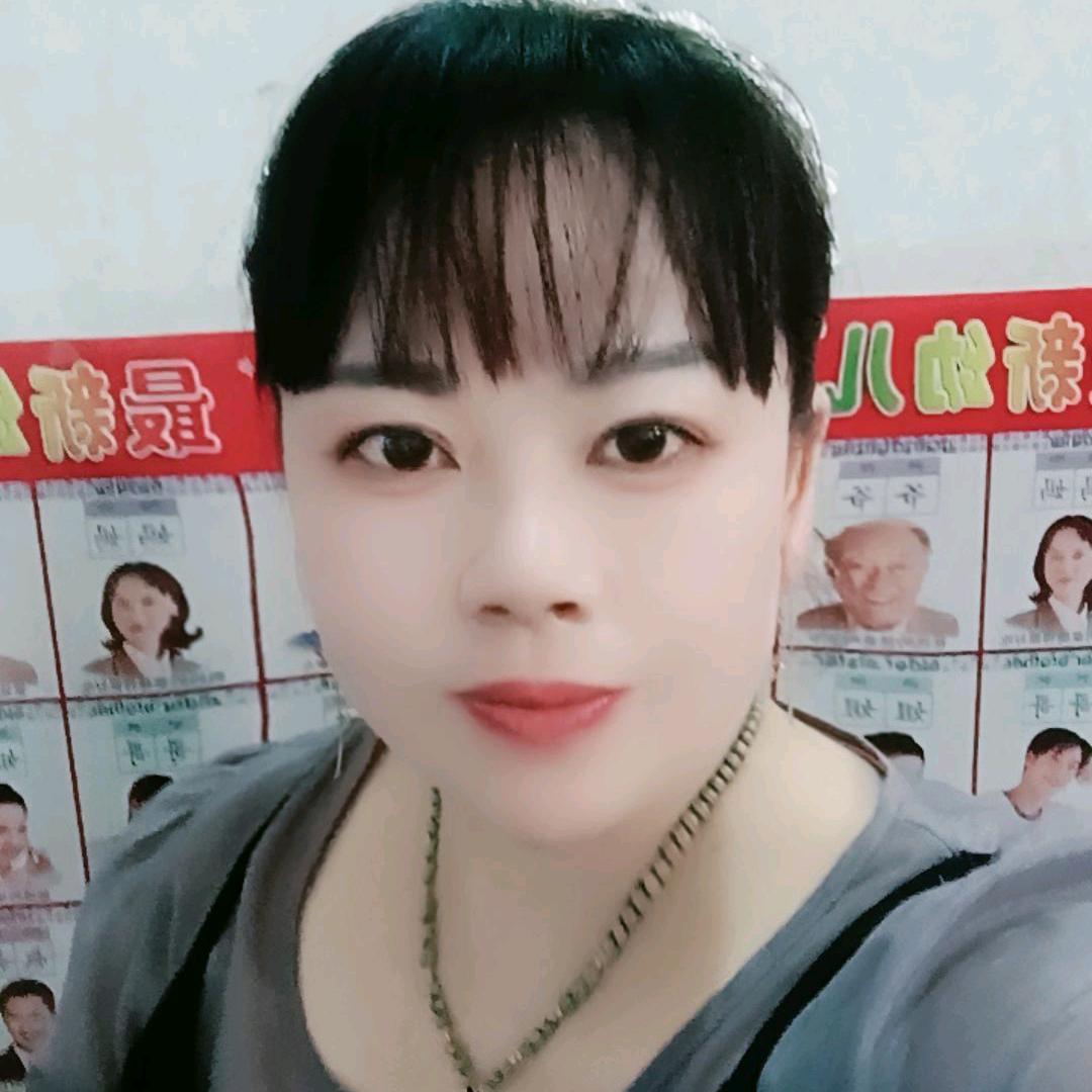 嫣红一笑