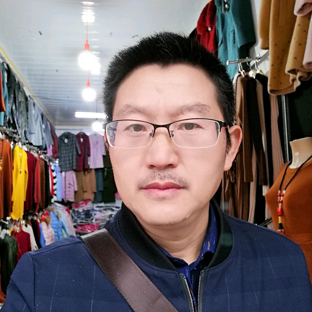 罗