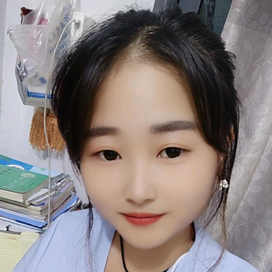 @万美