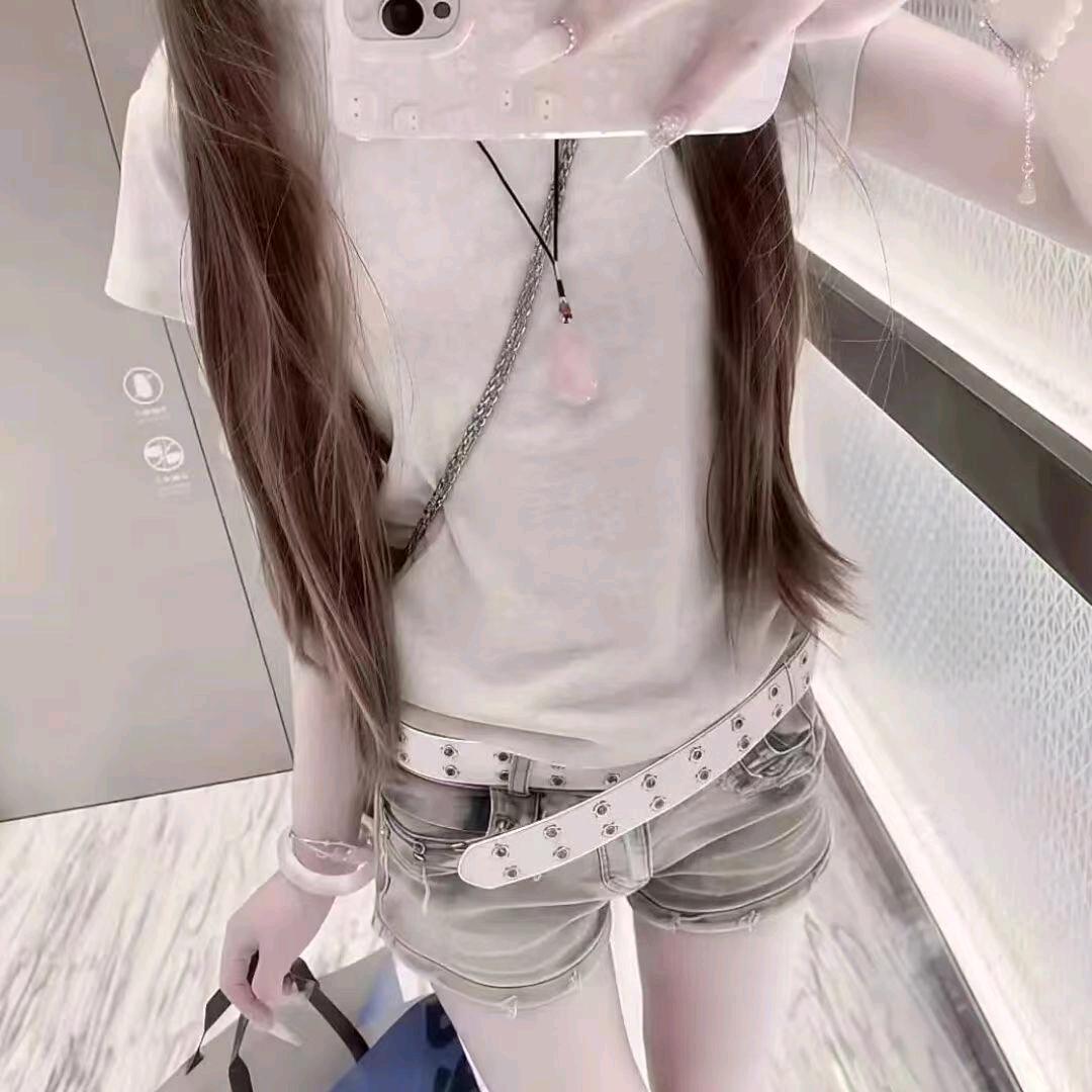七七