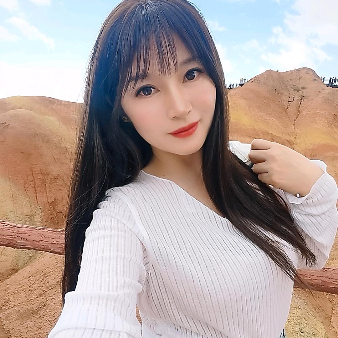 邱 游