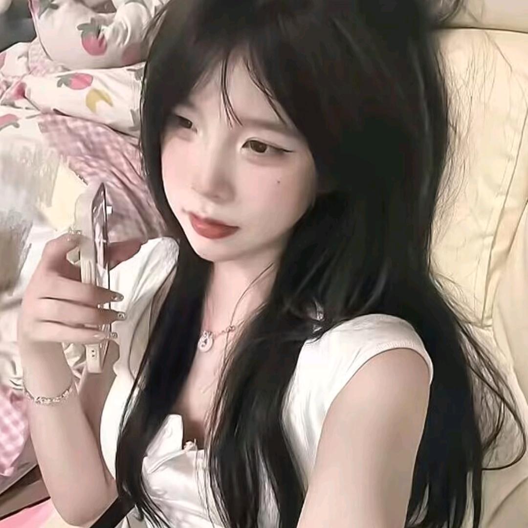 七七