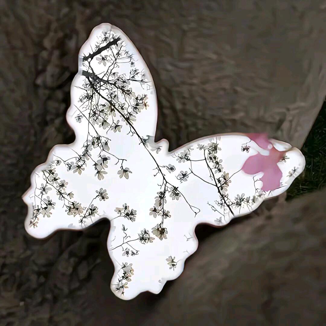 七七