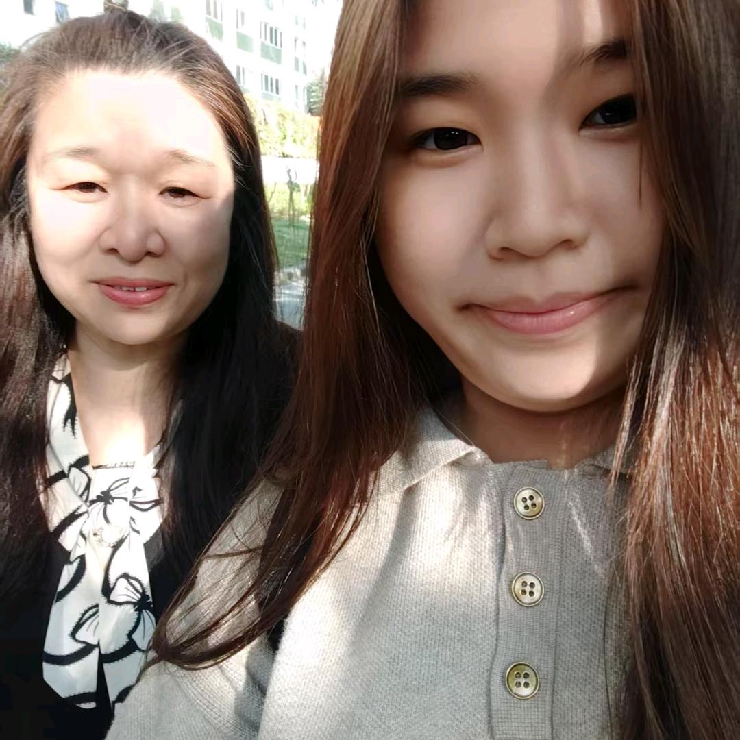 @周素英