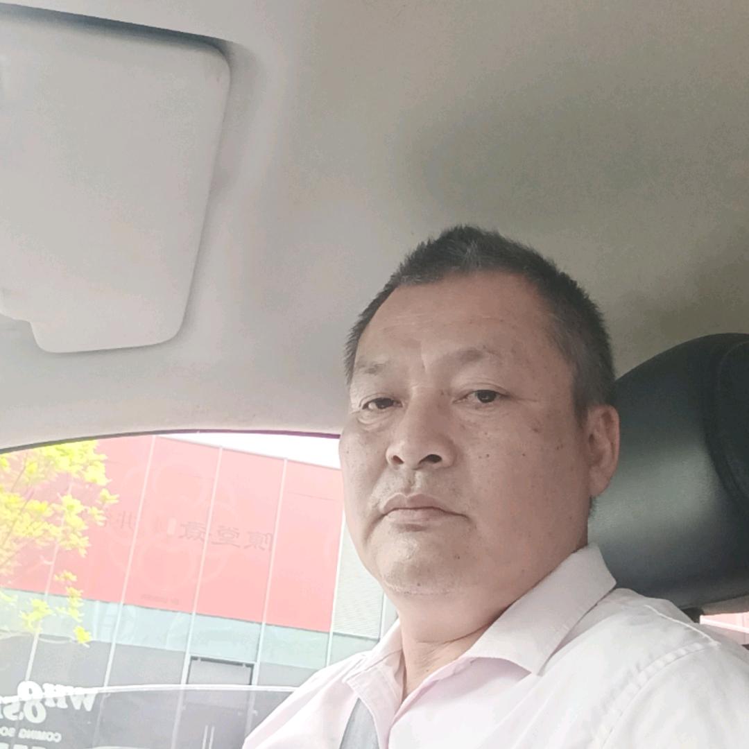 钟时亮，网约车司机