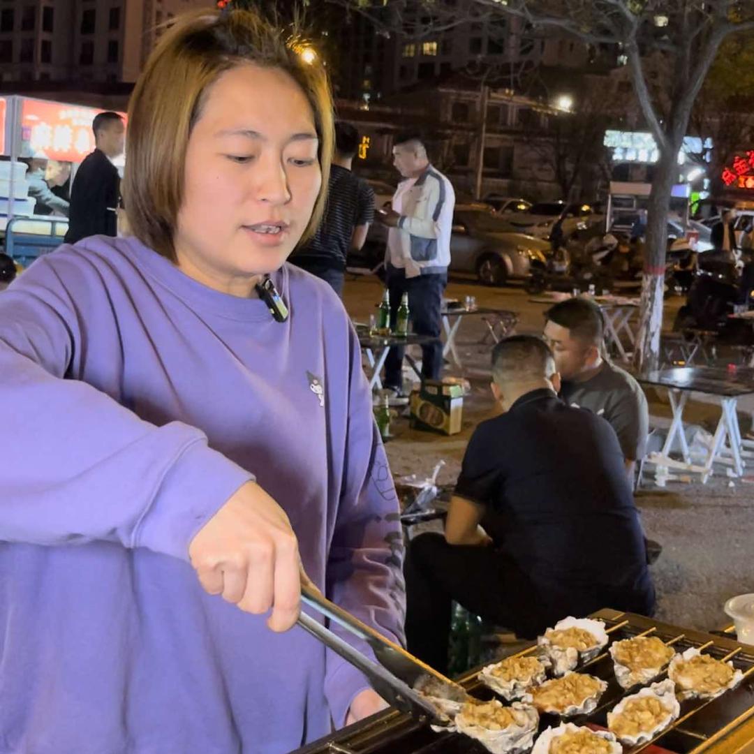 孝义东北烧烤张薇